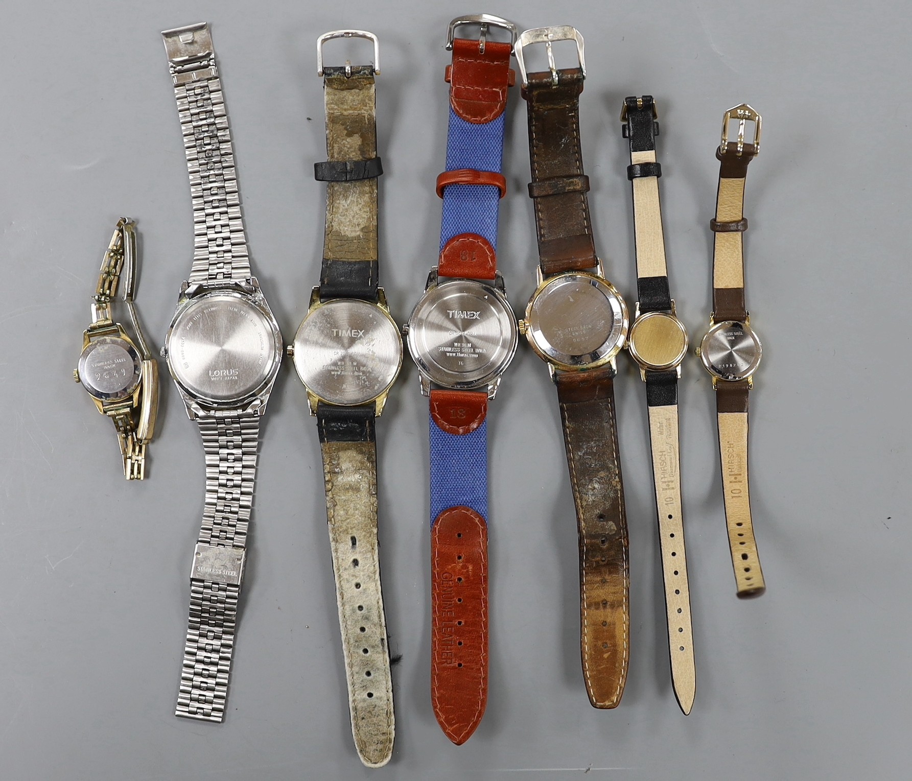 A lady's yellow metal Omega manual wind wrist watch and a group of assorted wrist watch including Lorus, Timex etc.